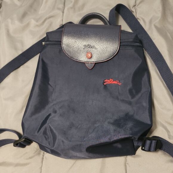 Longchamp Handbags - Navy Blue Backpack with Red Logo
